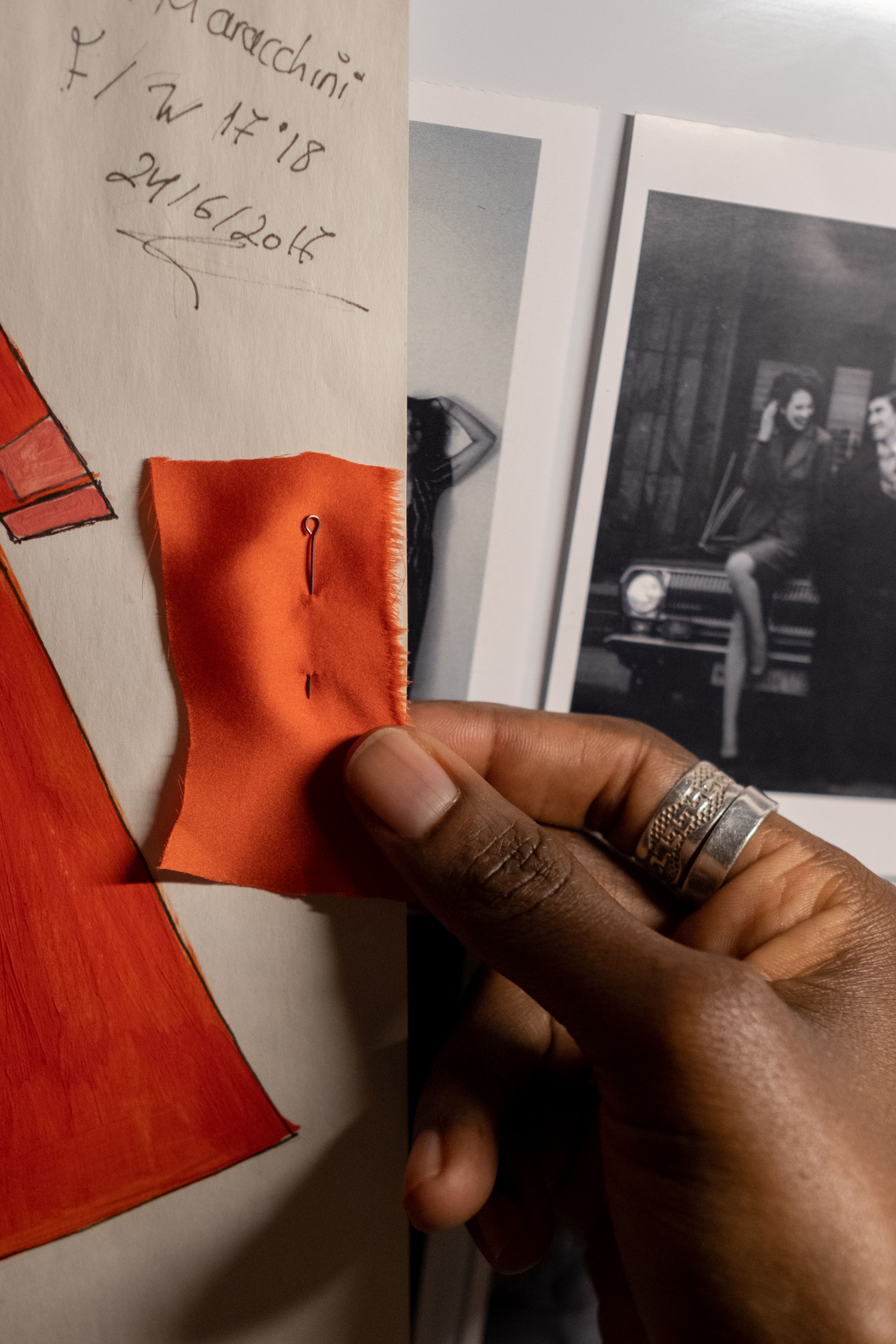 A designer selecting fabric and building a visual reference board