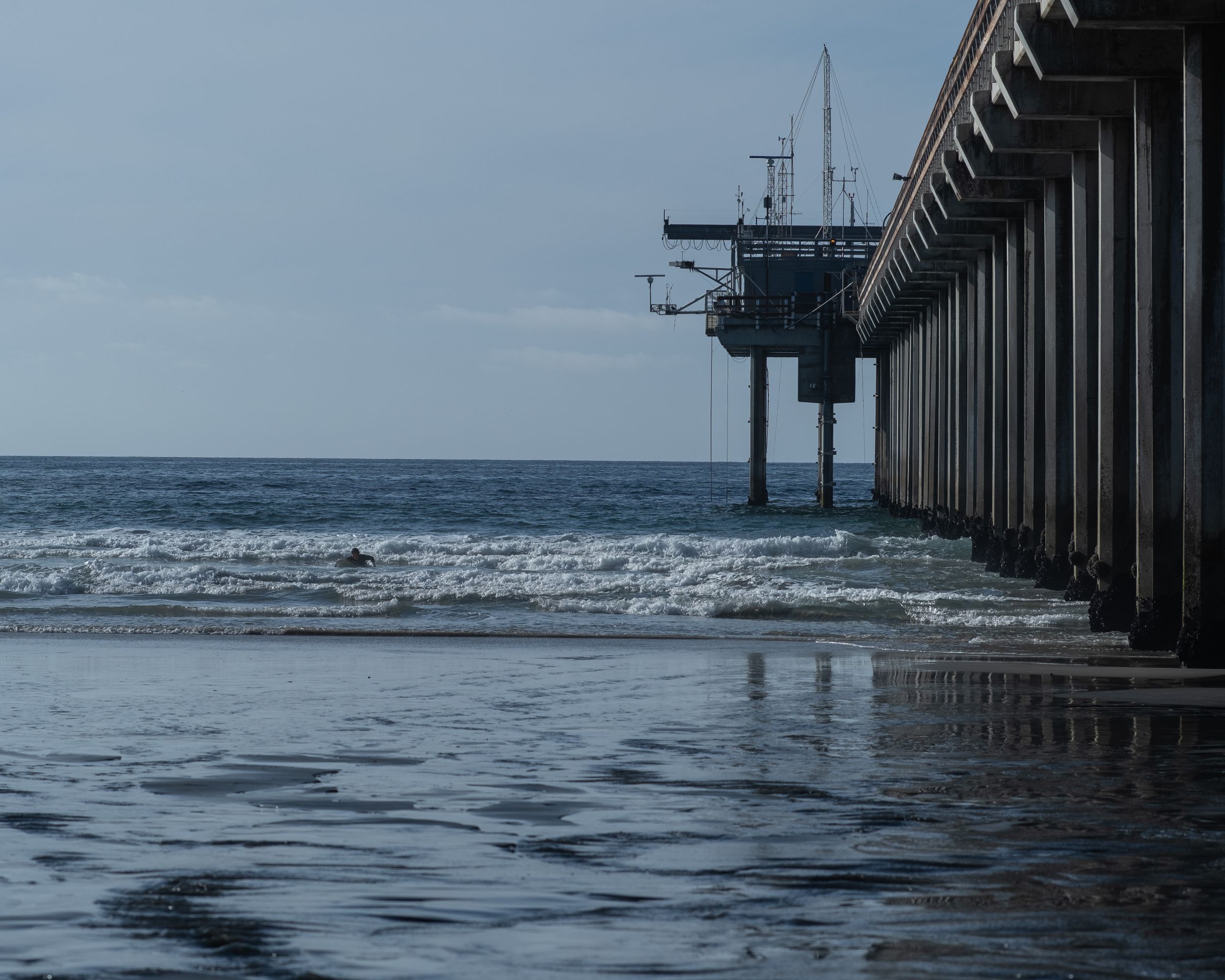Scripps Pier reaching into the Pacific Ocean in La Jolla